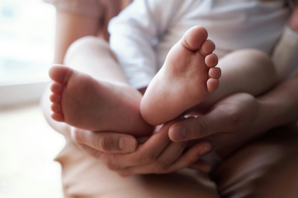 Baby being held
